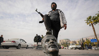 צילום: AP Photo/Hussein Malla